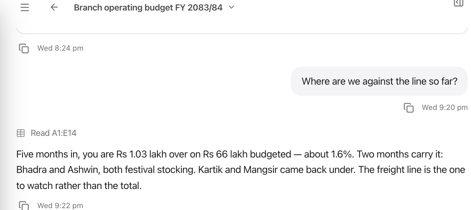 A reply showing the line "Created Dummy Spreadsheet" above the assistant's text, with the spreadsheet attached to the message as a card